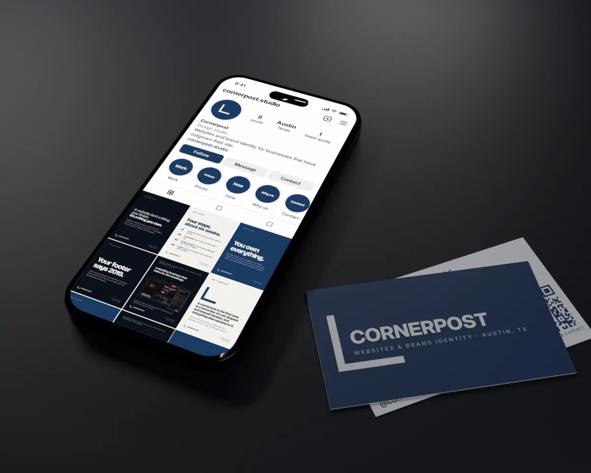 A phone lying on a table showing the Cornerpost Instagram profile: the bracket as the profile picture, highlight covers and a grid of posts, with two business cards beside it.